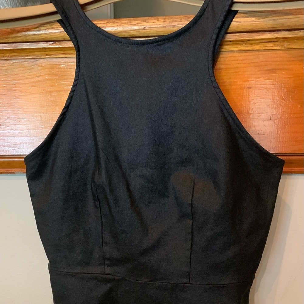 Black sleeveless fitted top by Melao